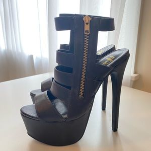 Black platform heels with gold zipper, women’s 6